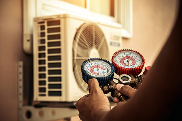 Professional Hvac technician working in Versailles, KY